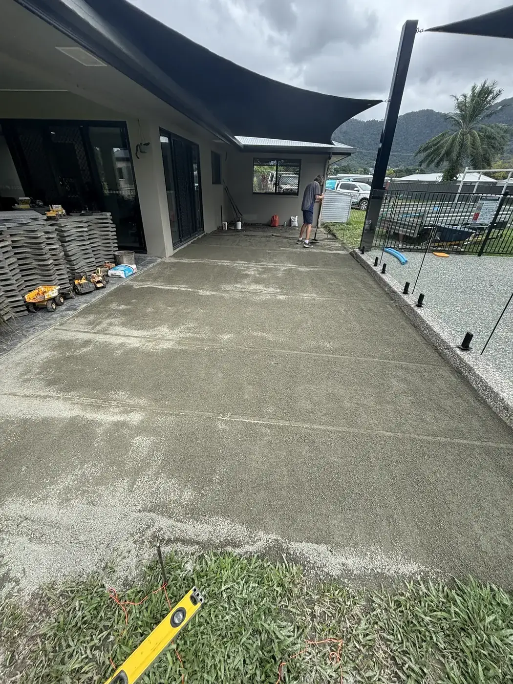 Finished paved outdoor living courtyard at a Cairns home — before